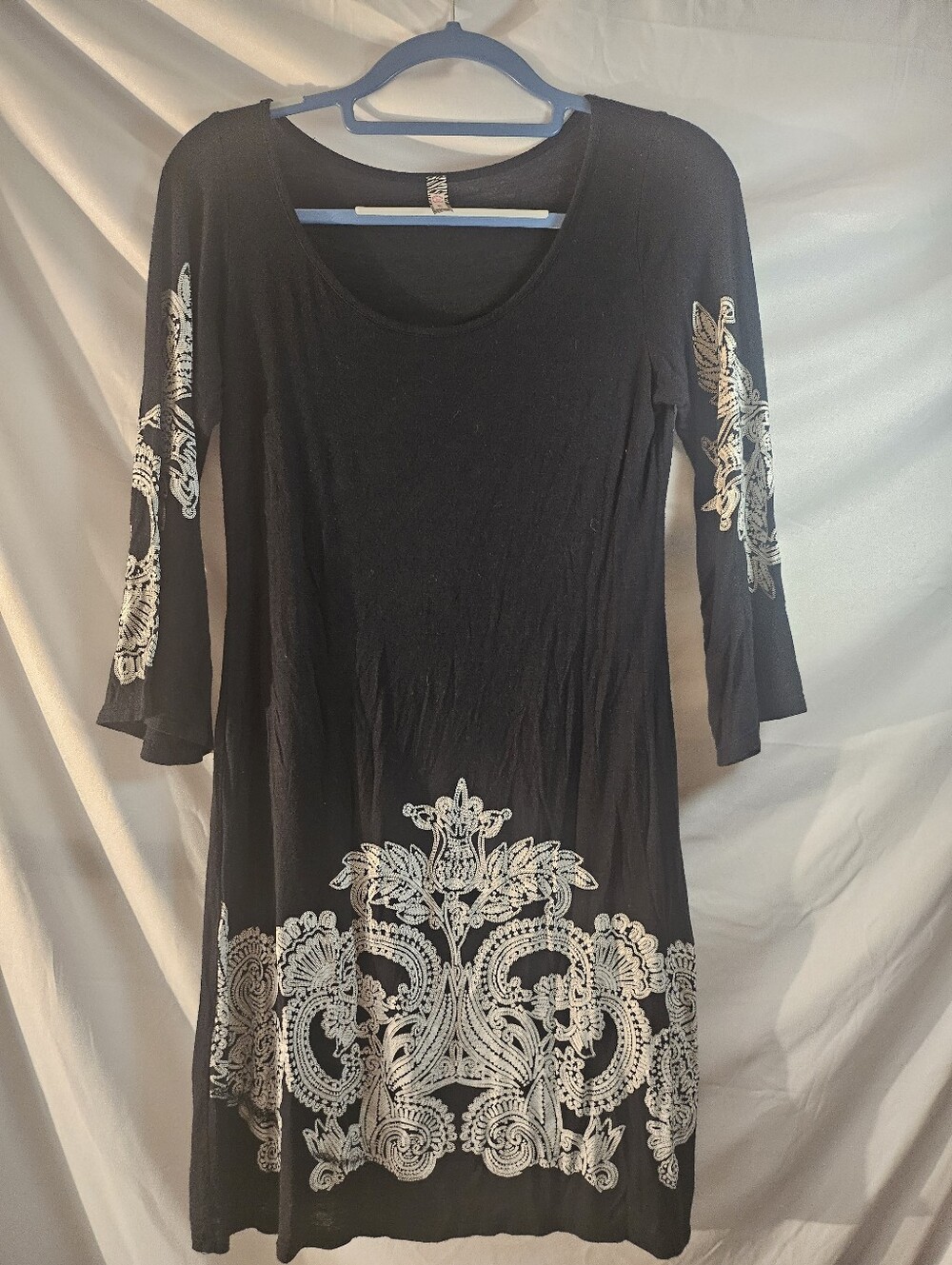 Black & white paisley print dress with 3/4 sleeves and a flowy fit